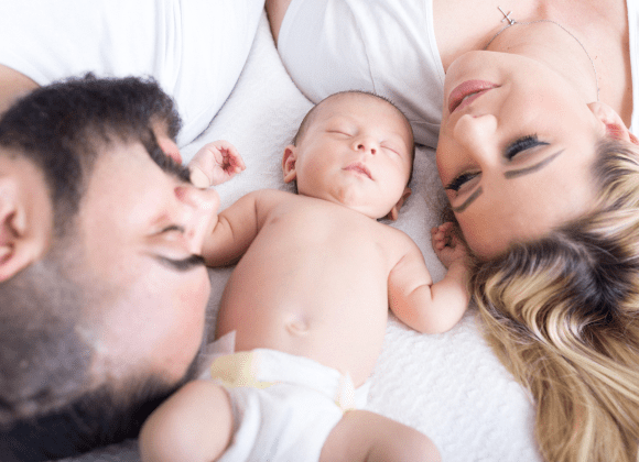 Couple with new born baby